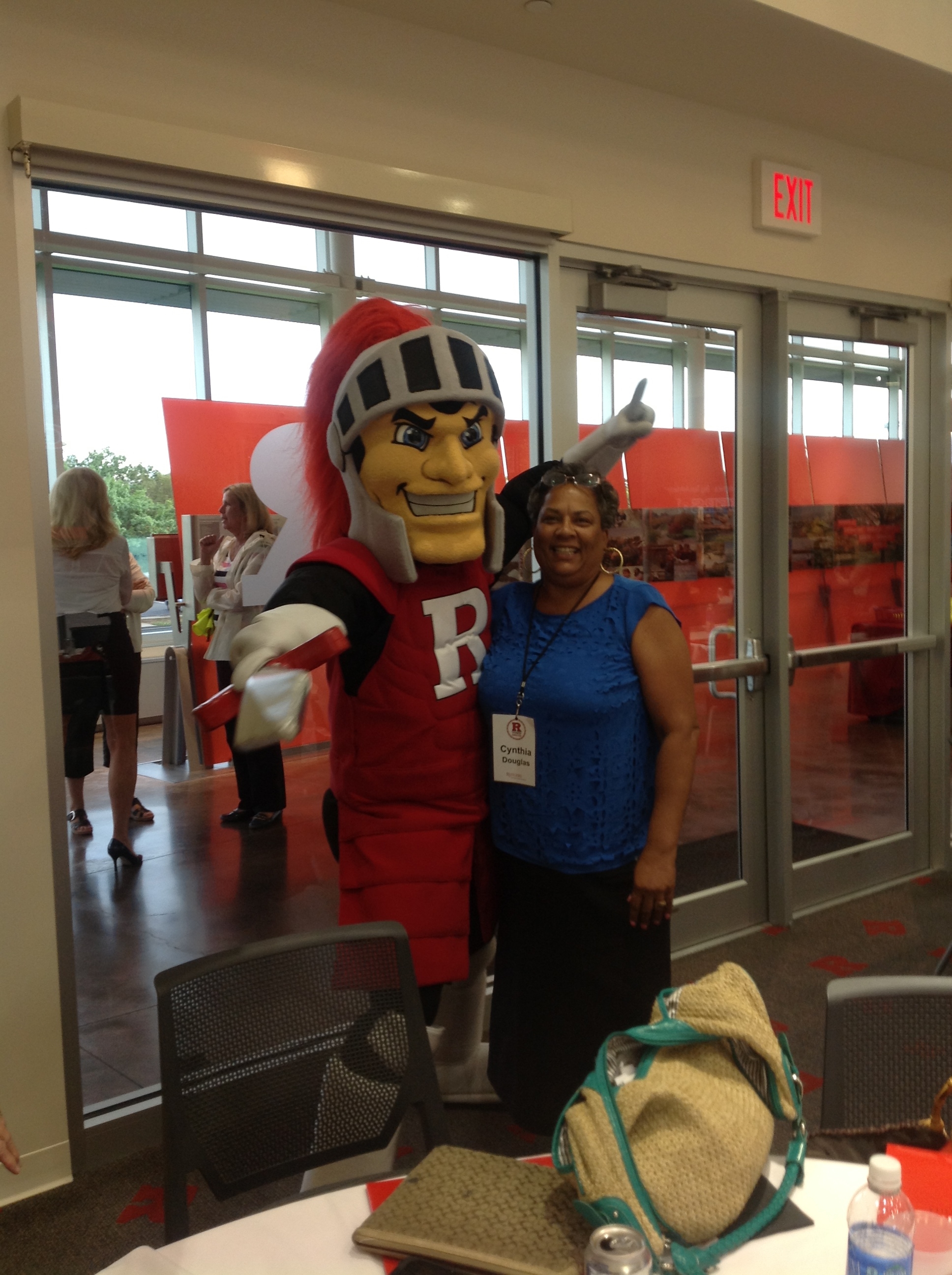 http://www.newvision-mccullydownstatepioneers.org/wp-content/uploads/2014/12/Cynthia-Douglas-with-rutgers-mascot.jpg